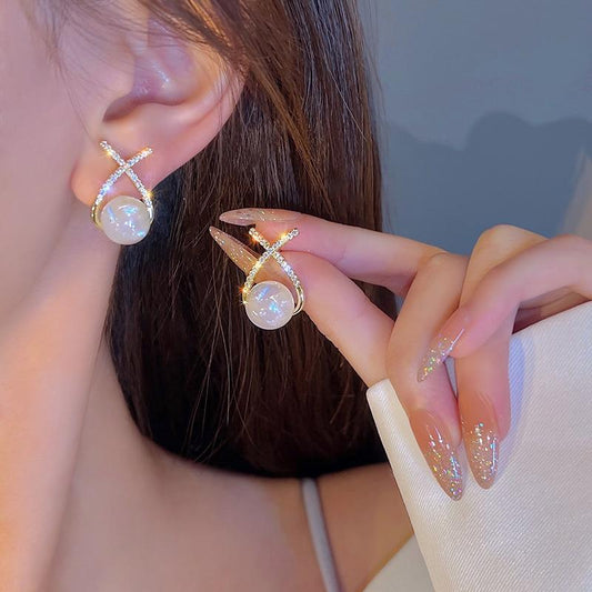 "Trendy Gold-Plated Earrings with Sparkling Artificial Stones Perfect for a Funky, Stylish Look."